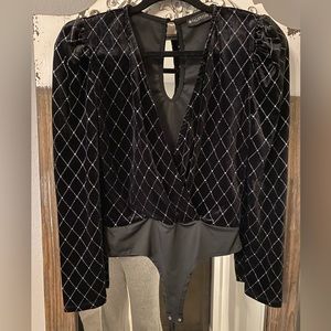 Black velvet shimmer bodysuit, size M. Never worn.